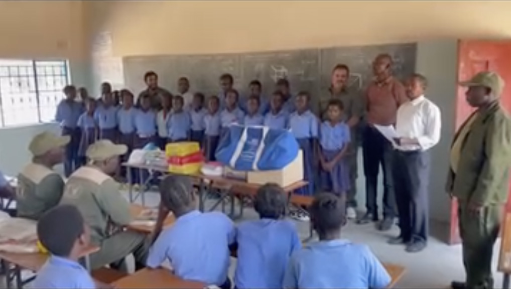 providing sci blule bags to schools in Zambia